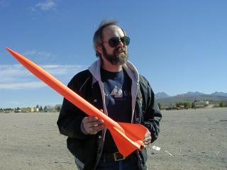 Photo of Joe with Aerotech 
Mustang rocket