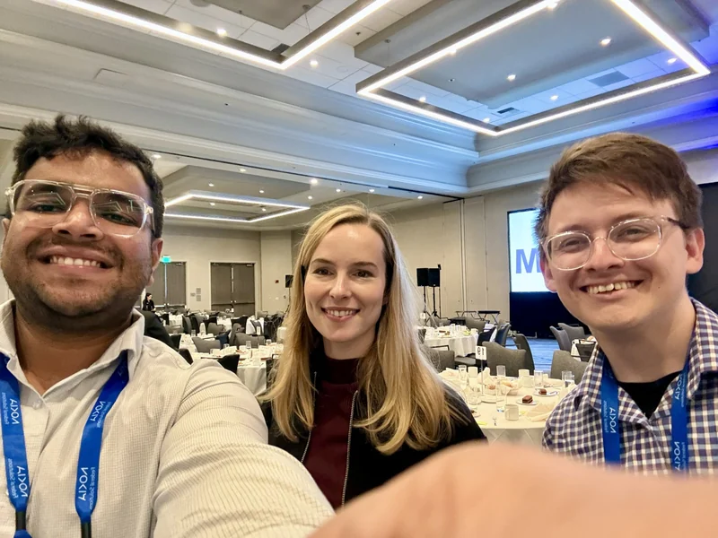 With Bridgit Mendler in the MILCOM 2025 conference hall.